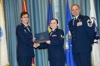 U.S. Air Force personnel at Joint Base San Antonio received their associates, bachelors, and masters degrees May 3, at a ceremony in the Fleenor Auditorium Joint Base San Antonio-Randolph. The Community College of the Air Force provides two year applied science degrees as part Air University's military education system. (U.S. Air Force photo by Benjamin Faske) (released)