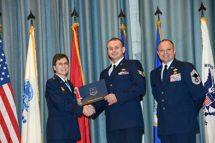 U.S. Air Force personnel at Joint Base San Antonio received their associates, bachelors, and masters degrees May 3, at a ceremony in the Fleenor Auditorium Joint Base San Antonio-Randolph. The Community College of the Air Force provides two year applied science degrees as part Air University's military education system. (U.S. Air Force photo by Benjamin Faske) (released)