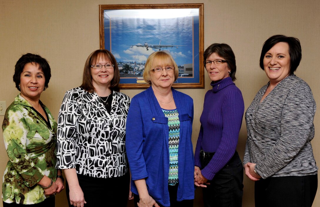 (from left to right) Nelda Barrientes 28th Medical Group secretary, Annette Thompson, 28th Operations Group secretary, Marian Tolley, 28th Bomb Wing secretary, Tammy Woerth, 28th Maintenance Group secretary, and Kelly Peters, 28th Mission Support Group secretary, gather at the 28th Bomb Wing Headquarters on Ellsworth Air Force Base, S.D., Feb. 4, 2013. Writing memos, scheduling appointments, managing commanders’ calendars and reviewing and assisting in the decoration process are just a few of the tasks these women perform as secretaries at Ellsworth. (U.S. Air Force photo by Airman 1st Class Anania Tekurio/Released)