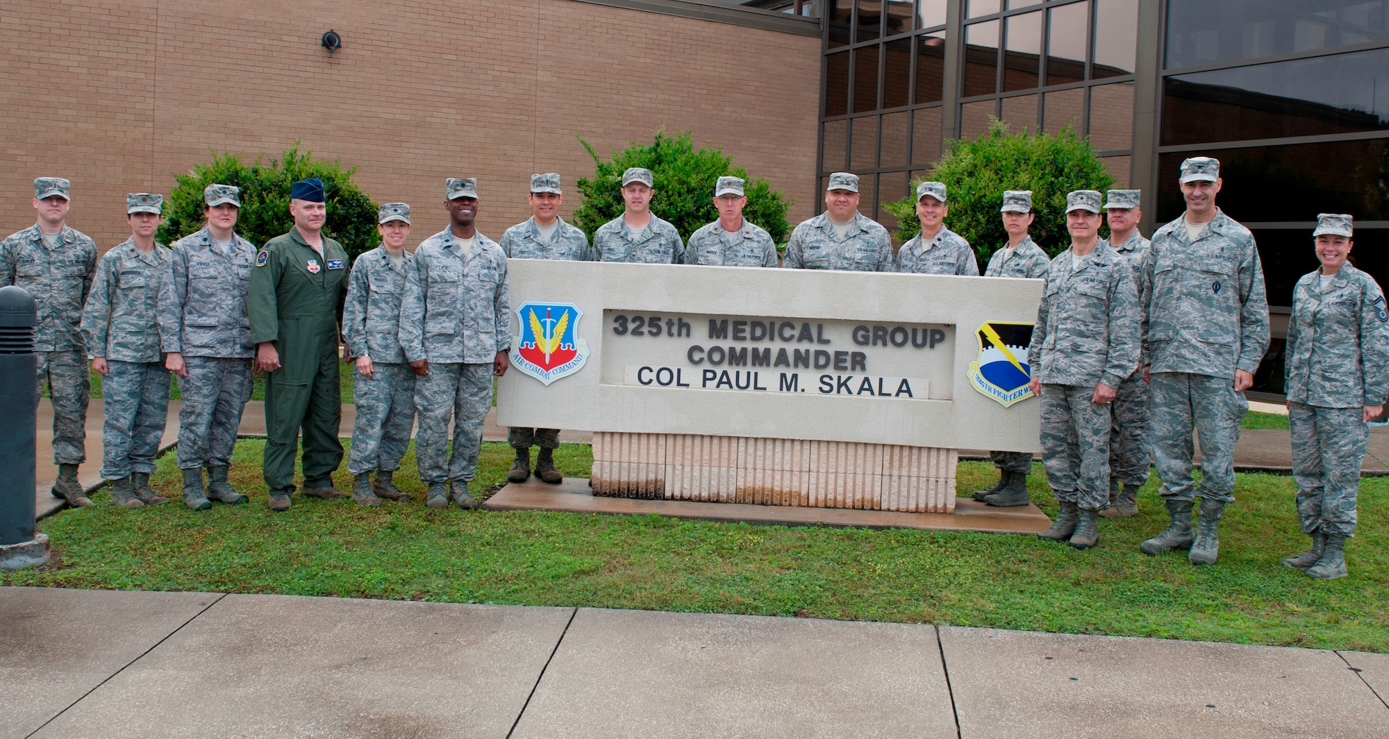 Brig. Gen. (Dr.) Sean L. Murphy, Air Force Medical Operations Agency commander from Lackland Air Force Base, Texas, posed with the 325th Medical Group leadership prior to his tour of the group's facilities May 3, 2013. (U.S. Air Force photo by Lisa Norman)