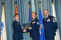 U.S. Air Force personnel at Joint Base San Antonio received their associates, bachelors, and masters degrees May 3, at a ceremony in the Fleenor Auditorium Joint Base San Antonio-Randolph. The Community College of the Air Force provides two year applied science degrees as part Air University's military education system. (U.S. Air Force photo by Benjamin Faske) (released)