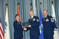 U.S. Air Force personnel at Joint Base San Antonio received their associates, bachelors, and masters degrees May 3, at a ceremony in the Fleenor Auditorium Joint Base San Antonio-Randolph. The Community College of the Air Force provides two year applied science degrees as part Air University's military education system. (U.S. Air Force photo by Benjamin Faske) (released)