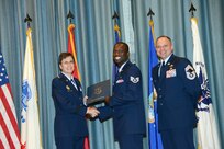U.S. Air Force personnel at Joint Base San Antonio received their associates, bachelors, and masters degrees May 3, at a ceremony in the Fleenor Auditorium Joint Base San Antonio-Randolph. The Community College of the Air Force provides two year applied science degrees as part Air University's military education system. (U.S. Air Force photo by Benjamin Faske) (released)