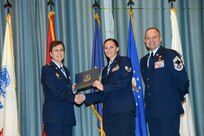 U.S. Air Force personnel at Joint Base San Antonio received their associates, bachelors, and masters degrees May 3, at a ceremony in the Fleenor Auditorium Joint Base San Antonio-Randolph. The Community College of the Air Force provides two year applied science degrees as part Air University's military education system. (U.S. Air Force photo by Benjamin Faske) (released)