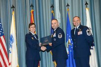 U.S. Air Force personnel at Joint Base San Antonio received their associates, bachelors, and masters degrees May 3, at a ceremony in the Fleenor Auditorium Joint Base San Antonio-Randolph. The Community College of the Air Force provides two year applied science degrees as part Air University's military education system. (U.S. Air Force photo by Benjamin Faske) (released)