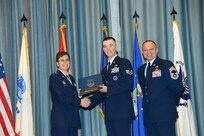 U.S. Air Force personnel at Joint Base San Antonio received their associates, bachelors, and masters degrees May 3, at a ceremony in the Fleenor Auditorium Joint Base San Antonio-Randolph. The Community College of the Air Force provides two year applied science degrees as part Air University's military education system. (U.S. Air Force photo by Benjamin Faske) (released)