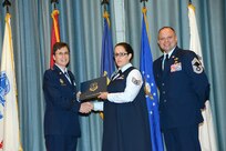 U.S. Air Force personnel at Joint Base San Antonio received their associates, bachelors, and masters degrees May 3, at a ceremony in the Fleenor Auditorium Joint Base San Antonio-Randolph. The Community College of the Air Force provides two year applied science degrees as part Air University's military education system. (U.S. Air Force photo by Benjamin Faske) (released)