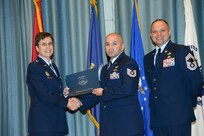 U.S. Air Force personnel at Joint Base San Antonio received their associates, bachelors, and masters degrees May 3, at a ceremony in the Fleenor Auditorium Joint Base San Antonio-Randolph. The Community College of the Air Force provides two year applied science degrees as part Air University's military education system. (U.S. Air Force photo by Benjamin Faske) (released)
