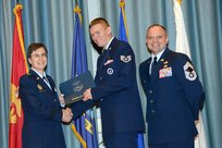 U.S. Air Force personnel at Joint Base San Antonio received their associates, bachelors, and masters degrees May 3, at a ceremony in the Fleenor Auditorium Joint Base San Antonio-Randolph. The Community College of the Air Force provides two year applied science degrees as part Air University's military education system. (U.S. Air Force photo by Benjamin Faske) (released)