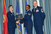 U.S. Air Force personnel at Joint Base San Antonio received their associates, bachelors, and masters degrees May 3, at a ceremony in the Fleenor Auditorium Joint Base San Antonio-Randolph. The Community College of the Air Force provides two year applied science degrees as part Air University's military education system. (U.S. Air Force photo by Benjamin Faske) (released)