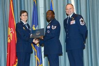 U.S. Air Force personnel at Joint Base San Antonio received their associates, bachelors, and masters degrees May 3, at a ceremony in the Fleenor Auditorium Joint Base San Antonio-Randolph. The Community College of the Air Force provides two year applied science degrees as part Air University's military education system. (U.S. Air Force photo by Benjamin Faske) (released)