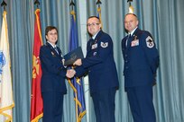 U.S. Air Force personnel at Joint Base San Antonio received their associates, bachelors, and masters degrees May 3, at a ceremony in the Fleenor Auditorium Joint Base San Antonio-Randolph. The Community College of the Air Force provides two year applied science degrees as part Air University's military education system. (U.S. Air Force photo by Benjamin Faske) (released)