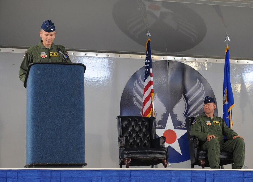 U.S. Air Force Col. Billy Thompson, 23d Wing commander, thanks Col. Ron Stuewe, outgoing 23d Fighter Group commander, for his time and leadership during a change of command ceremony at Moody Air Force Base, Ga., May 3, 2013. Stuewe has been the 23d FG commander for the past 20 months. (U.S. Air Force photo by Airman Alexis Grotz/Released) 