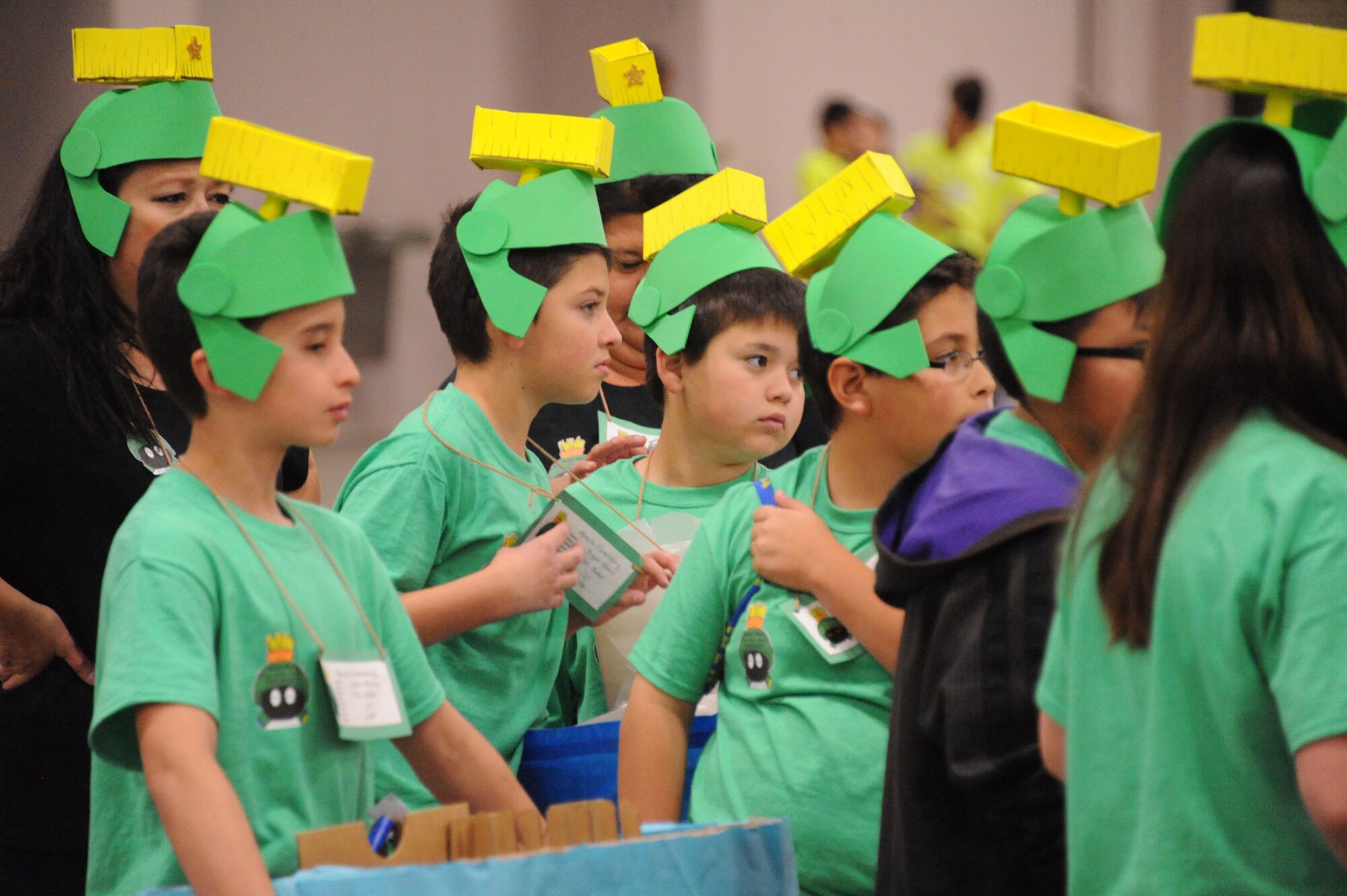 Students tackled Mars-related challenges, including finding a sustainable food source and developing recreational activities to do while living on the planet. One team presented its findings in matching Marvin the Martian headgear and t-shirts. (Photo by Todd Berenger)