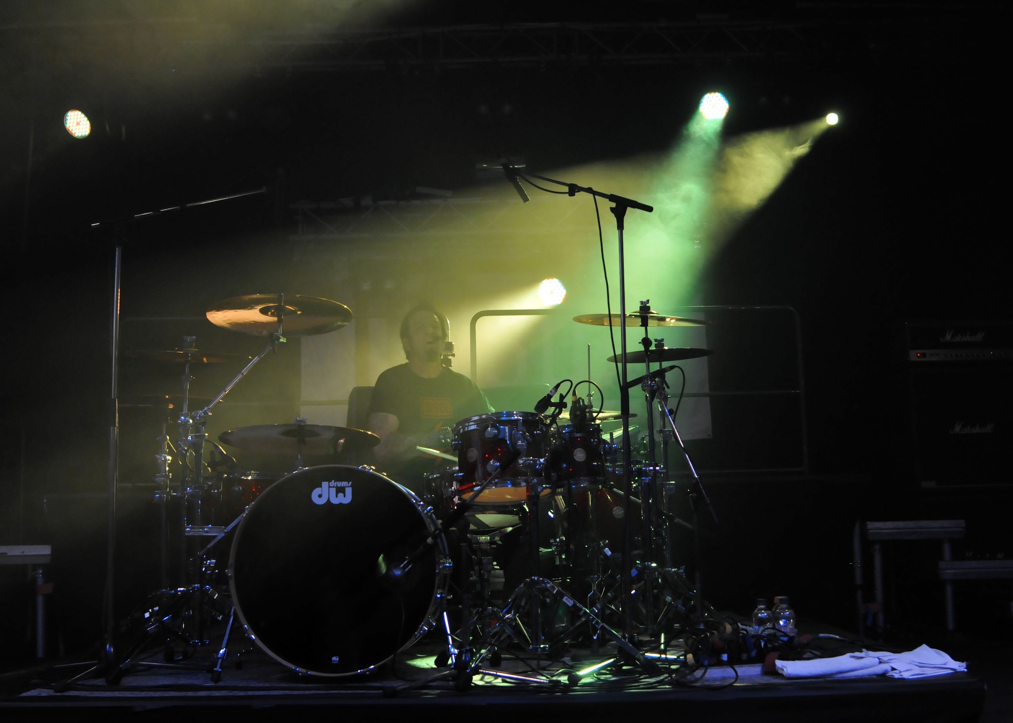 Mike Luce, Drowning Pool drummer, introduces a new song as part of a concert sponsored by the USO May 3, 2013, at RAF Mildenhall, England. Drowning Pool visited the base as part of their European tour. (U.S. Air Force photo by Airman 1st Class Kelsey Waters/Released)