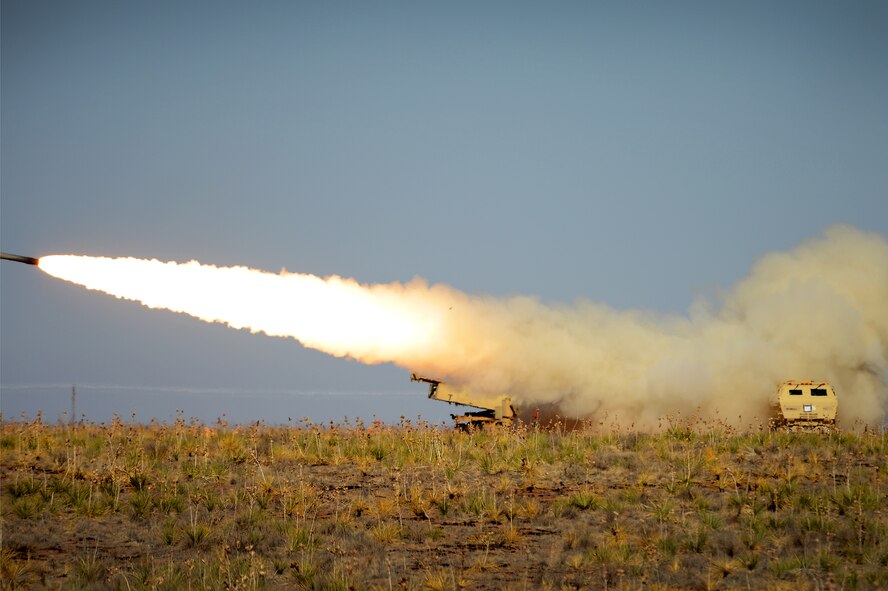 A High Mobility Artillery Rocket System (HIMARS) crew fires a reduced range practice rocket at Melrose Air Force Range N.M. in support of Emerald Warrior April 24, 2013. Emerald Warrior simulated special operations components in urban and irregular warfare settings.The exercise leveraged lessons learned from Operation Iraqi Freedom, Operation Enduring Freedom and other historical events to provide combatant commanders with a better-trained and ready force. (U.S. Air Force photo/ Staff Sgt. Matthew Plew)