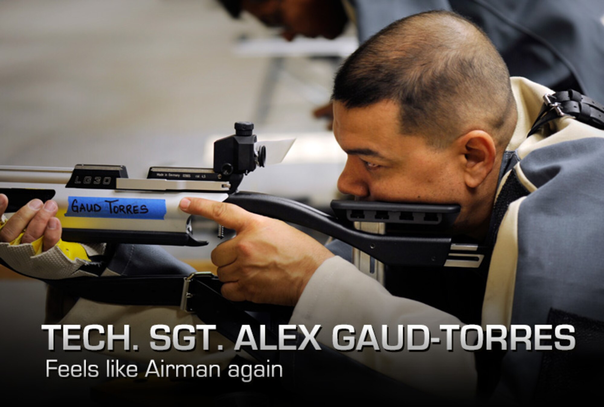 Tech. Sgt. Alex Gaud-Torres checks out his target during the Warrior Games training camp held in Colorado Springs, Colo., Apr. 16, 2013. Gaud-Torres resides at Beale Air Force Base, Calif. (Photo by Desiree Palacios