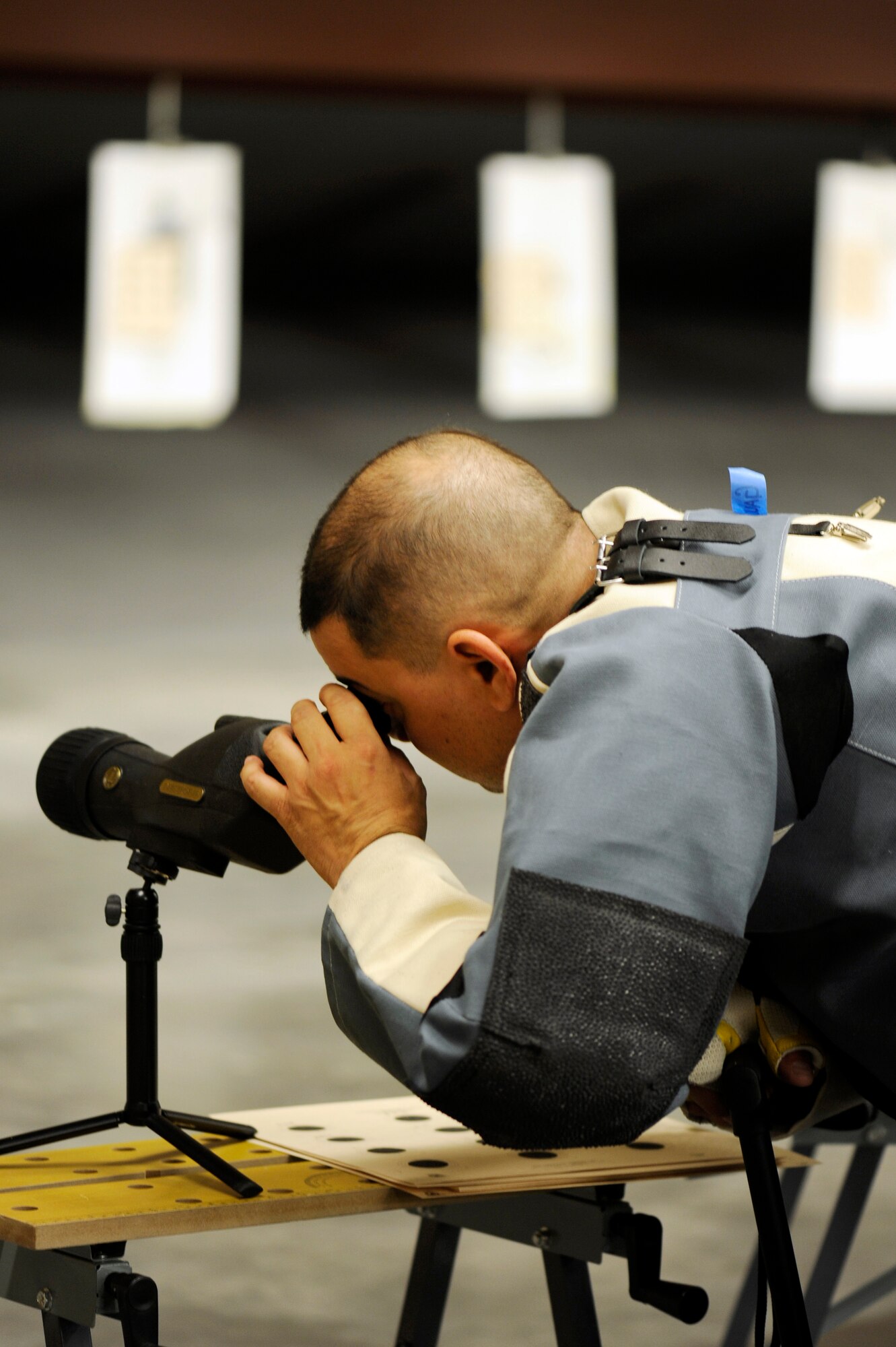 Axel Gaud-Torres checks out his target during the Wound Warrior Games Training Camp held in Colorado Springs, Colo., Apr. 16, 2013. Gaud-Torres resides at Beale Air Force Base, Calif.