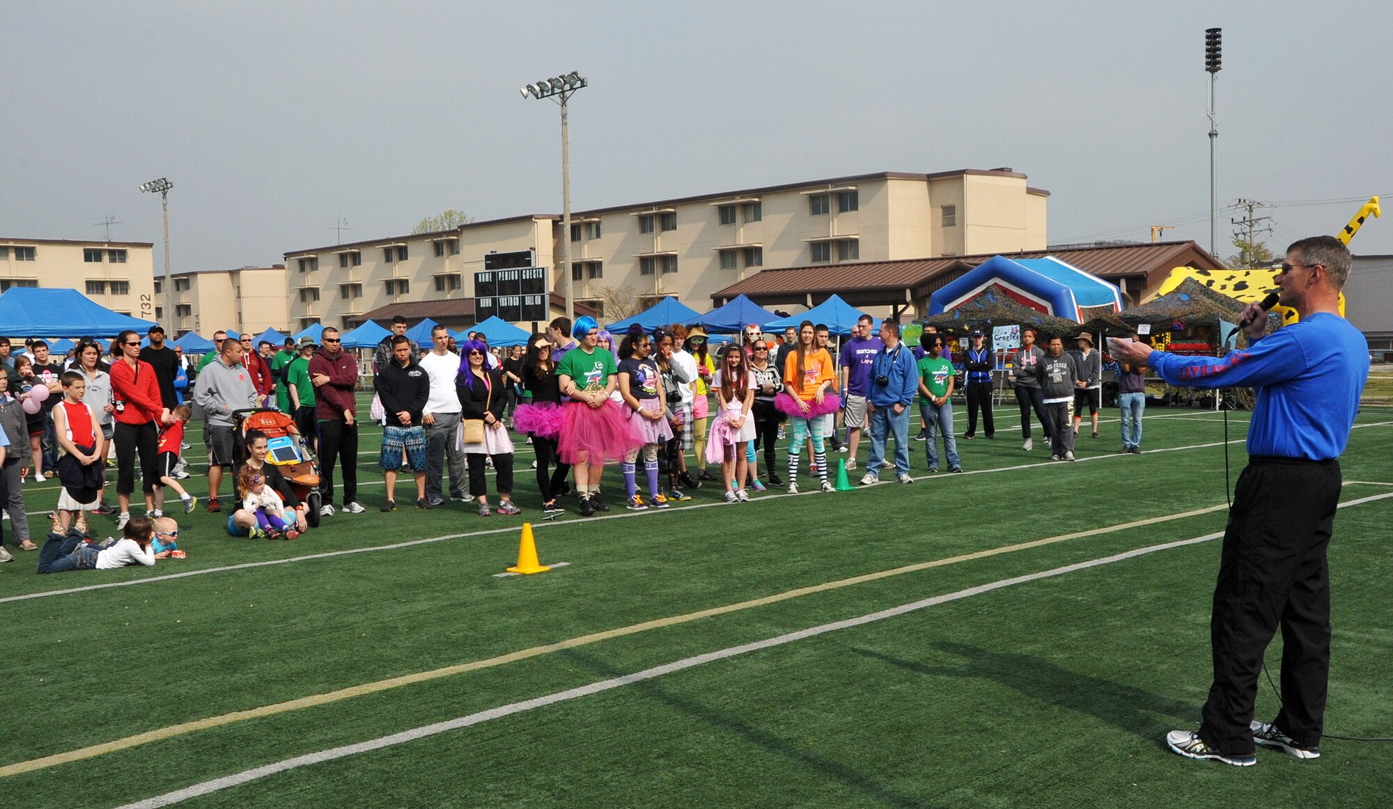 Col. Patrick McKenzie, 51st Fighter Wing commander, makes opening remarks at the Relay for Life walk on the Osan American High School football field at Osan Air Base, Republic of Korea May 4 -5, 2013. Participants raised more than $94,000 this year in support of the American Cancer Society, well over the initial goal of $60,000. (U.S. Air Force photo/Senior Airman Kristina Overton)