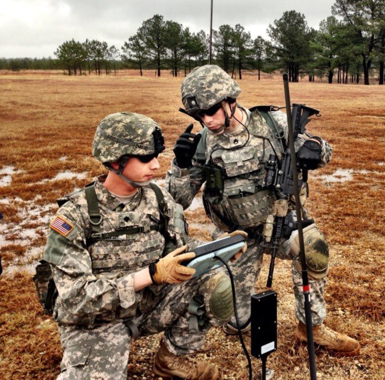 U.S. Army Spc. Michael Piatzer (left), and Staff Sgt. Jacob Wendland operate an unmanned aerial system recently during the Army Expeditionary Warrior Experiment event. 