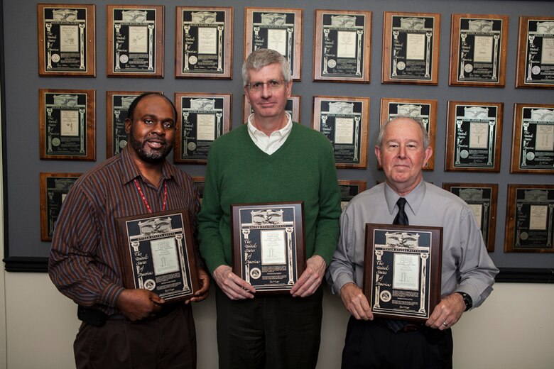 Co-inventors, from left to right, Dr. Kevin Abraham, Dr. Robert Ebeling, and Dr. Bob Welch of ERDC.  Not shown are Ms. Karen Buehler and Ms. Claudia Quigley of Natick.