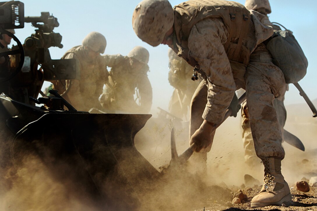 Marines with Battery C, 1st Battalion, 11th Marine Regiment, emplace the M777A2 Howitzer at the Rainbow Training Area April 23, as part of an artillery competition against the rest of the regiment. They were scored and timed on their emplacement, fire and displacement.  