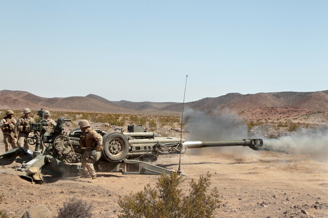 Marines with Battery I, 3rd Battalion, 12th Marine Regiment, execute three rounds of direct fire within two minutes at targets at the Rainbow Training Area April 23. The battery was taking part in 11th Marine Regiment’s artillery competition and faced three other battalions from the regiment. 

