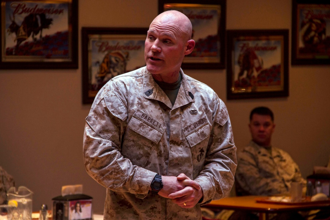 Sergeant Major of the Marine Corps Micheal P. Barrett discusses current issues with Marines from Recruiting Station Twin Cities and Marines Wing Support Squadron 471 March 28. For additional imagery from the event visit www.facebook.com/rstwincities.   