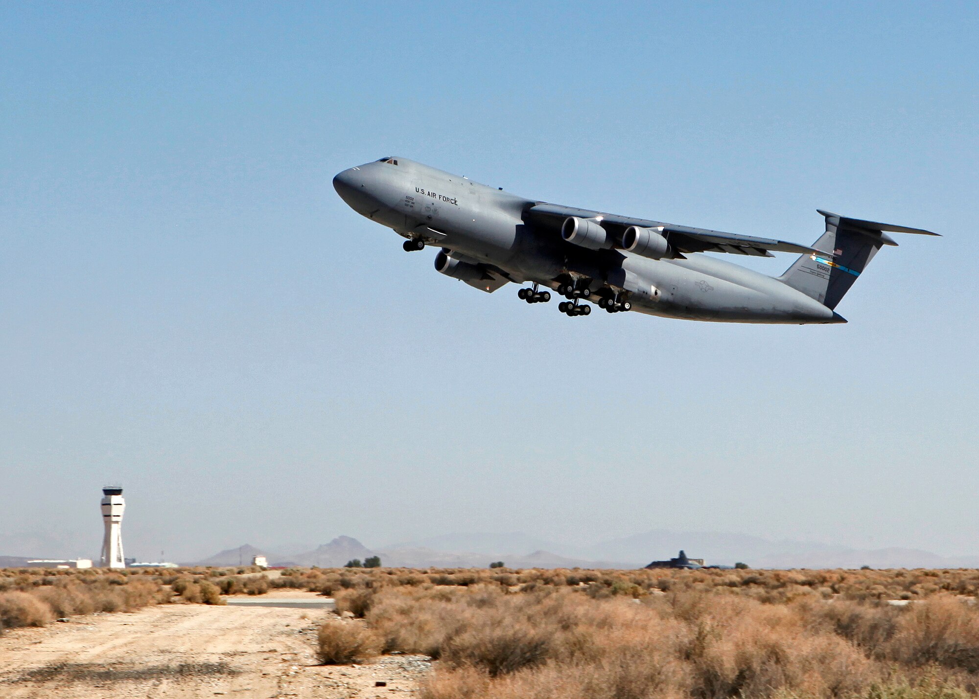 A C-5M Super Galaxy from Dover Air Force Base, Del., takes off from Edwards Runway 22L April 26, 2013, during a sortie to test the recent Block 3.5.2 software upgrade. C-5M Block 3.5.2 software upgrade testing is projected to be completed by the end of May 2013. (U.S. Air Force photo by Jet Fabara)