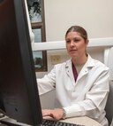 Tech. Sgt. Kendra Lauruhn, 47th Medical Operations Squadron dental hygienist, inputs a dental patient’s information at Laughlin Air Force Base, Texas, May 6, 2013. The dental clinic recently kept Laughlin members’ dental readiness at 99.3 percent despite undergoing renovations to their facility. (U. S. Air Force photo/Airman 1st Class John D. Partlow)