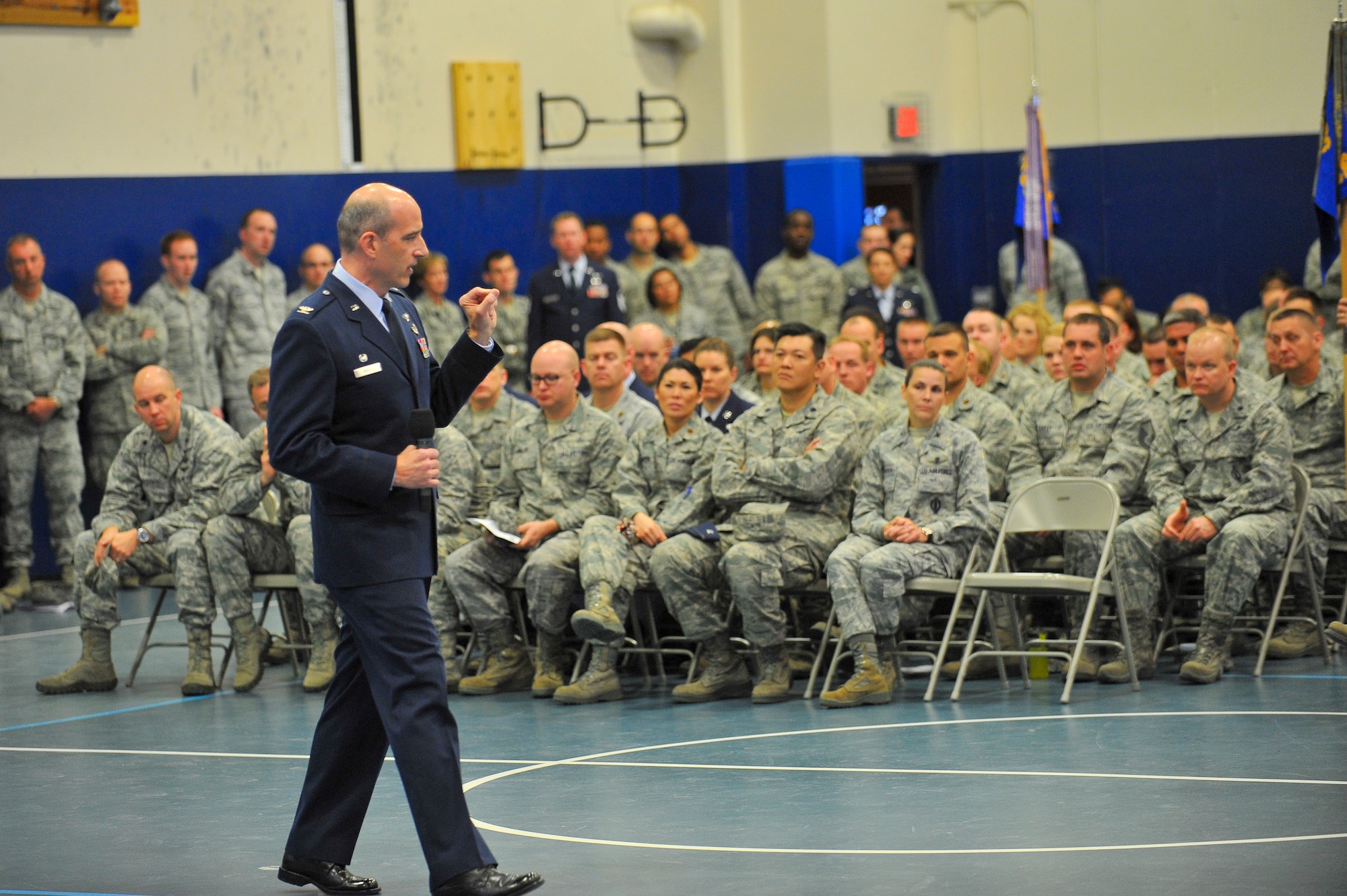 U.S. Air Force Col. Jeffrey T. Mineo, 310th Space Wing commander, speaks to the members of the 310 SW during his commander's call on Schriever Air Force Base, Colo., May 4, 2013.
(U.S. Air Force photo by Tech. Sgt. Nicholas B. Ontiveros/Released)