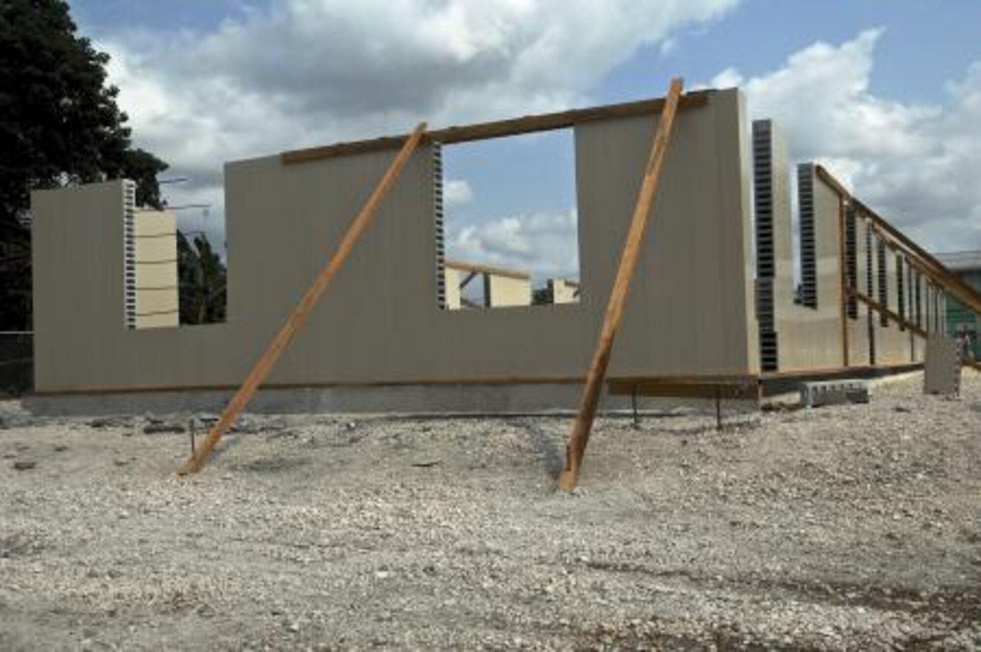 The New Horizons construction teams are training in Belize using a fast, stay-in-place concrete wall forming system. The exterior walls of three of the four classrooms under construction are using this system, which is faster to construct. Pictured, is the concrete wall forming system at the Trial Farm Government School construction site April 30, 2013. Civil engineers from both the U.S. and Belize are constructing various structures at schools throughout Belize as part of an exercise called New Horizons. Building these facilities will support further education for the children of the country and provide valuable training for U.S. and Belizean service members. (U.S. Air Force photo/Master Sgt. James Law)