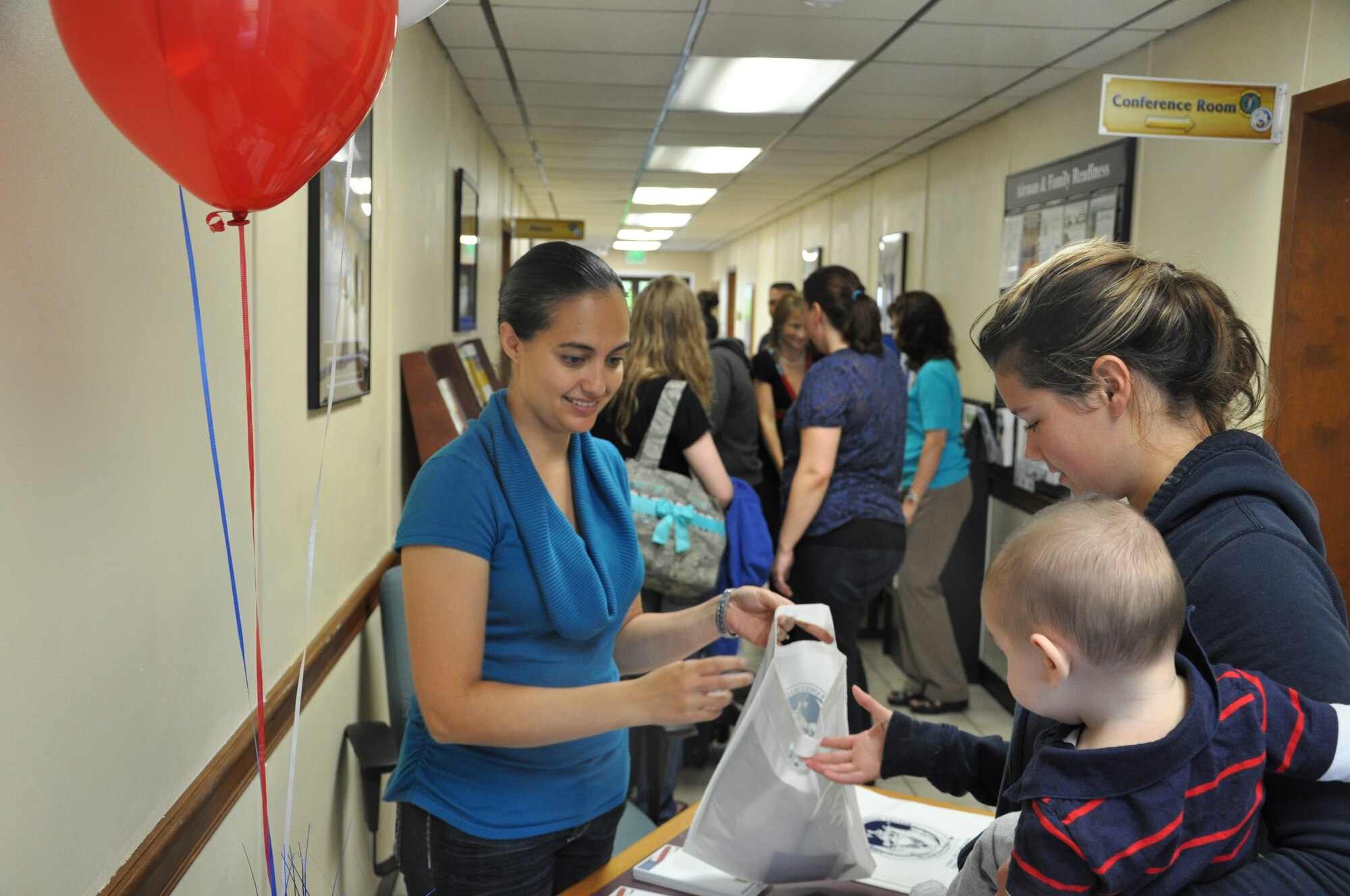 One hundred and eight spouses and children were treated to free food, door prizes, a children’s craft area and an assortment of information about the base during Military Spouse Appreciation Day May 3 at the Airman and Family Readiness Center. (U.S. Air Force photo by Airman 1st Class Alex Echols)