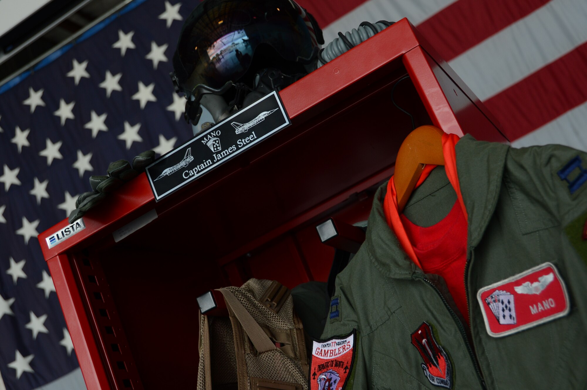 SHAW AIR FORCE BASE, S.C. - A locker containing items that represented U.S. Air Force Capt. James Steel and his career were displayed during his memorial service in Hangar 1200 at Shaw Air Force Base, S.C., April 30, 2013. Steel, a member of the 77th Fighter Squadron was killed when his F-16 Fighting Falcon crashed during combat maneuvers in Afghanistan April 3, 2013. More than 500 people attended the memorial. (U.S. Air Force photo by Master Sgt. Cohen A. Young/Released)
