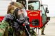 U.S. Air Force Staff Sgt. Trent Otto, a firefighter with the Rosecrans Fire Department, Missouri Air National Guard, demonstrates equipment that would be used in a chemical environment during Task Qualification Training (TQT) at Rosecrans Air National Guard Base, Mo., May 4, 2013. The base conducted TQT to prepare for an operational readiness inspection next year which tests Airmen’s ability to survive and operate in a war time environment. (U.S. Air National Guard photo by Senior Airman Sheldon Thompson/Released)