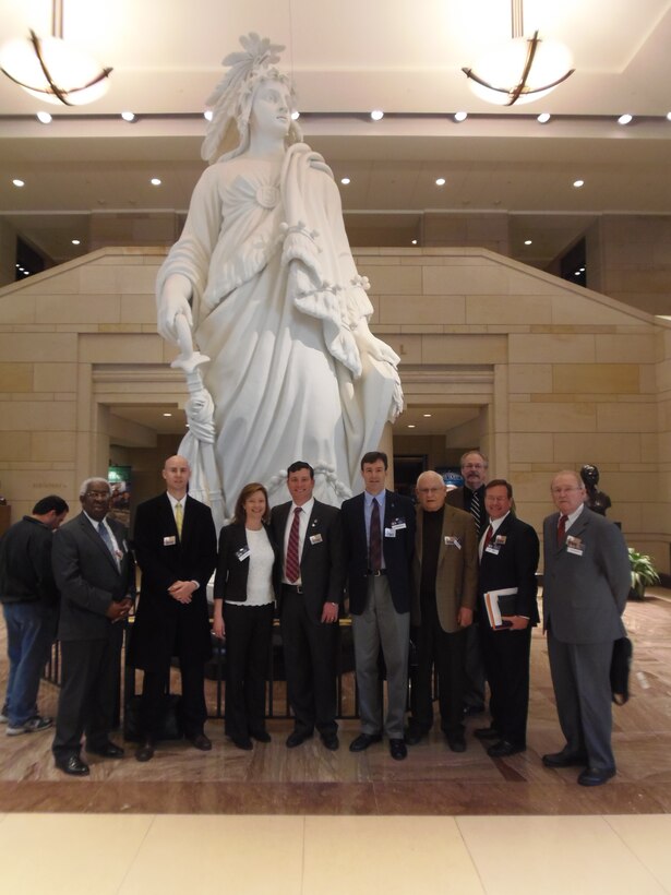 Members of Arnold Community Council pause during visits with elected officials (l-r) Manchester Mayor Lonnie Norman, Manchester Area Chamber of Commerce President Jon Bell, ATA Public Affairs Manager Kathy Gattis, Shelbyville-Bedford County Chamber of Commerce President and ACC Vice President Ben Craig, ATA Deputy Director of Integrated Test and Evaluation Dr. Rob McAmis, Industrial Board of Coffee County Chairman Bill Comer, (back row) City of Manchester City Liaison Terry Dendy, ATA Director of Information Technology and Systems Mark Rigney and Industrial Board of Coffee County Executive Director Ted Hackney.