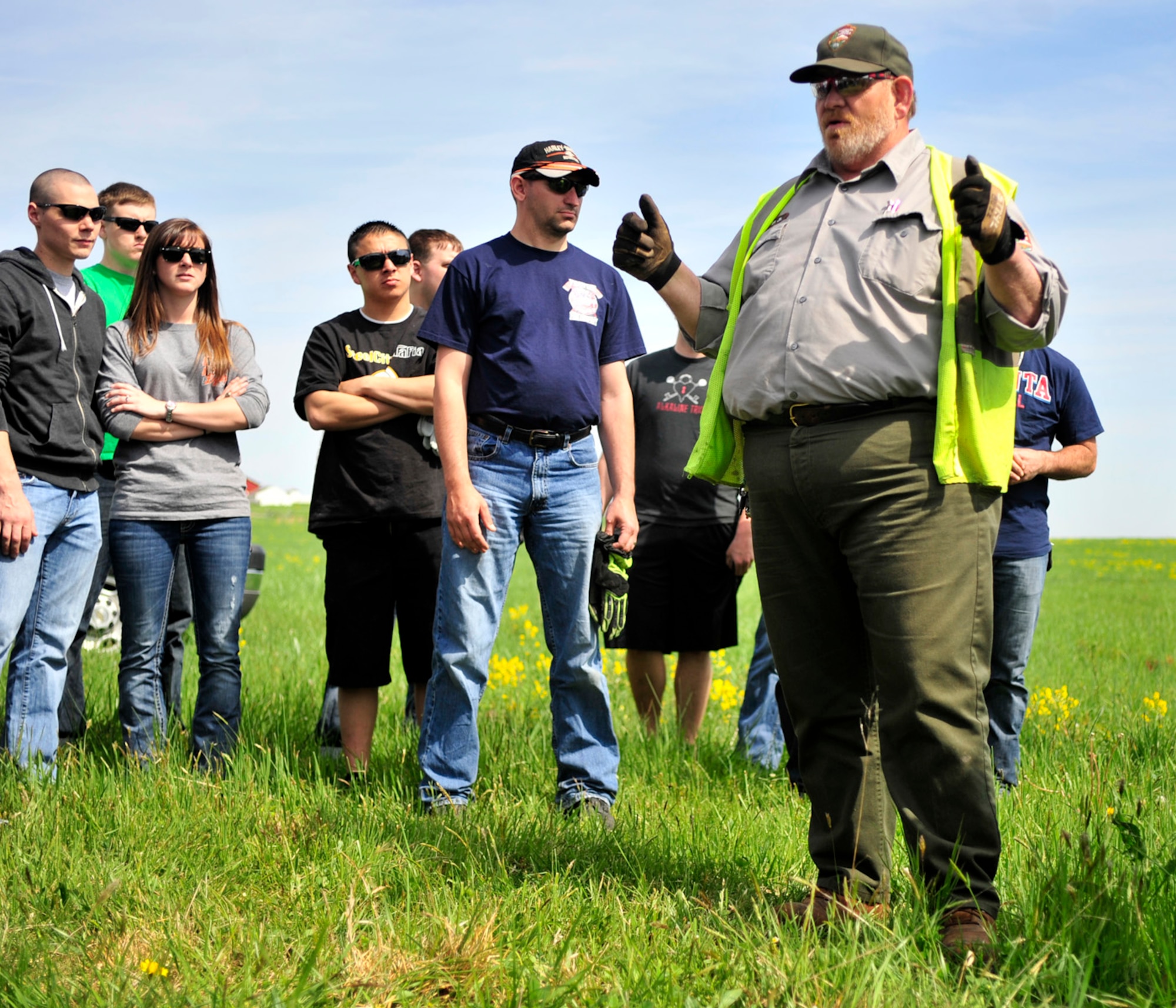 Walter Baker, Gettysburg National Military Park welder, explains to a group of volunteers from Dover Air Force Base, Del., what they will be doing May 3, 2013, at Gettysburg, Pa. A group of 125 volunteers from Team Dover helped clean Gettysburg as part of the Adopt-a-Position. (U.S. Air Force photo/Tech. Sgt. Chuck Walker)