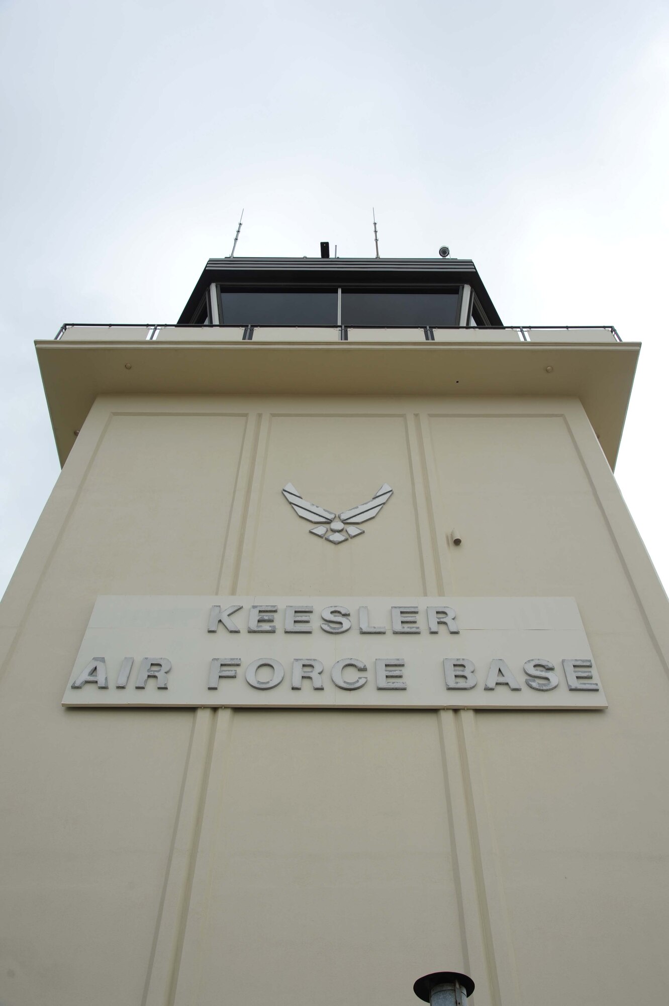 The air traffic control tower shown is where air traffic controllers conduct their business.  Airfield Operators perform and manage airfield operations functions and activities, including air traffic control, airfield management, and base operations to facilitate the flying mission at their base. They provide staff supervision and technical assistance, as well as develop and formulate plans and policies for managing and operating Air Force airfield operations.  (U.S. Air Force photo by Kemberly Groue)