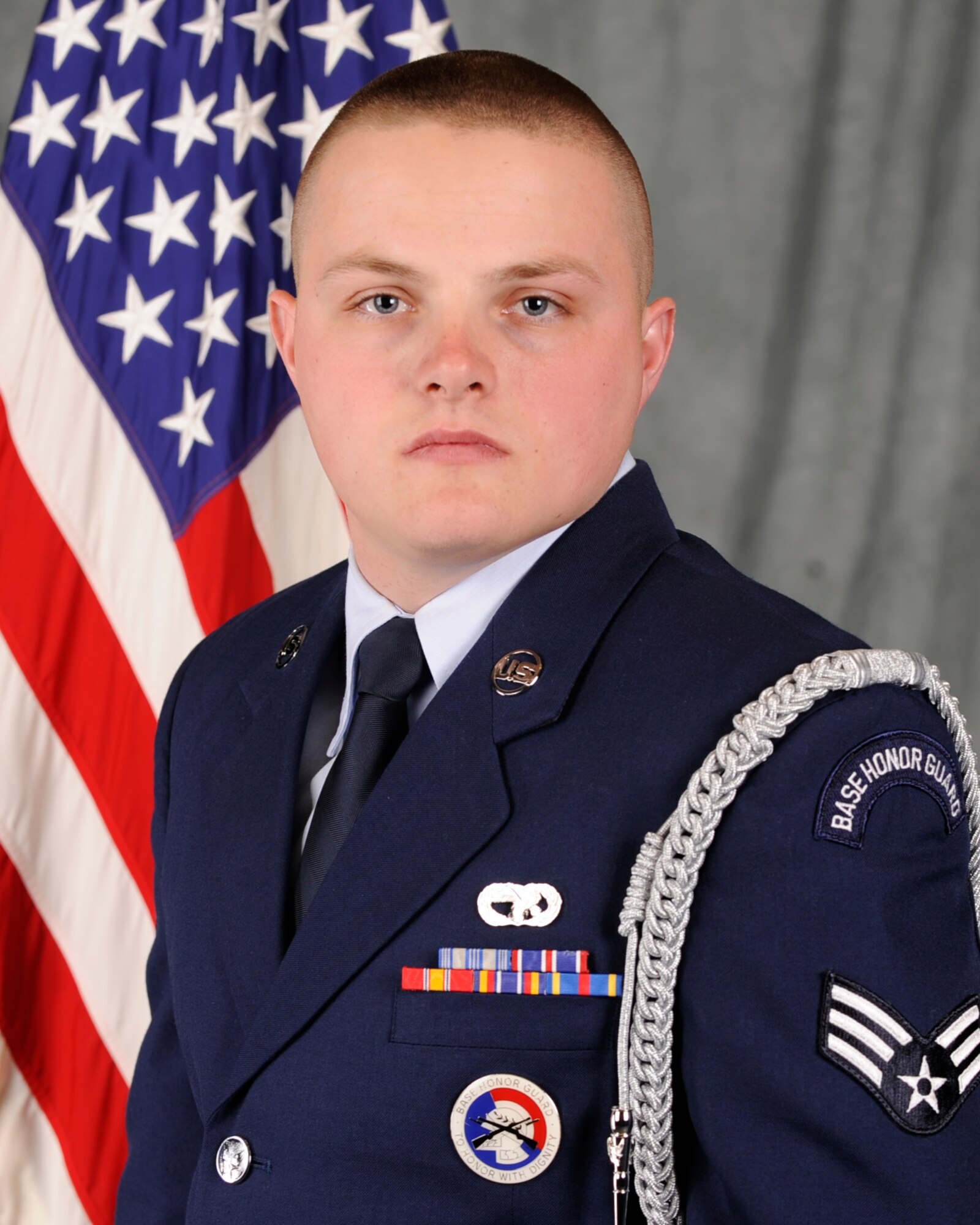 Senior Airman Dexter Tapley poses for his official photo April 4, 2012, at Mountain Home Air Force Base, Idaho. Tapley was named 2013 Honor Guardsman of the Year and is currently assigned to the 51st Logistics Readiness Squadron, Osan Air Base, Korea, as a vehicle and vehicular equipment maintenance journeyman. (U.S. Air Force photo by Senior Airman Benjamin Sutton/Released)