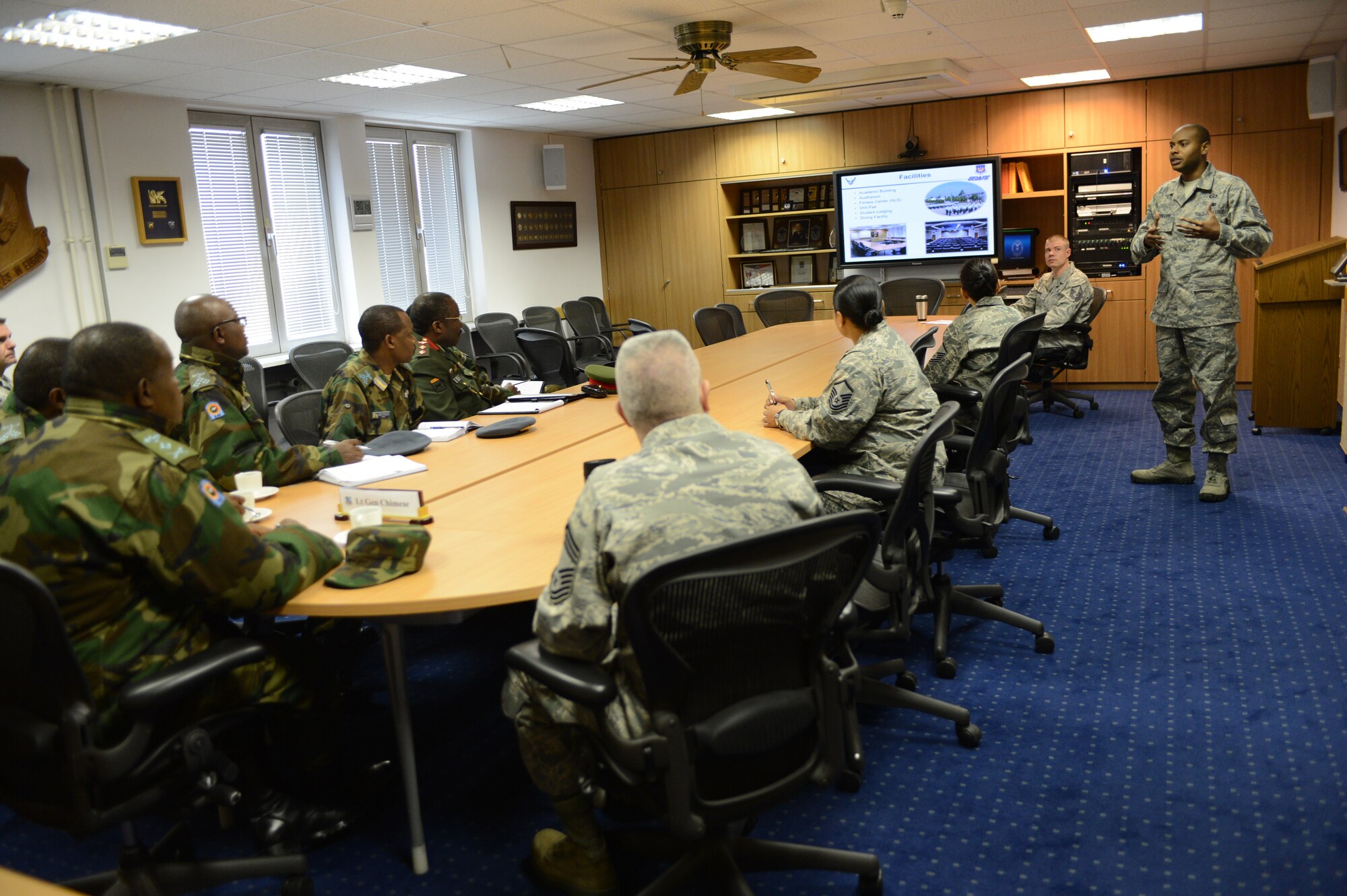 Tech. Sgt. Corey Survillion, Kisling NCO Academy instructor, informs members of the Zambian air force of the mission at the NCOA, April 30, 2013 on Kapaun, Germany. The visit gave the Zambian air force a chance to further military relations and improve the partnership between the U.S. and Zambian air forces. (U.S. Air Force photo/Senior Airman Caitlin O’Neil-McKeown)