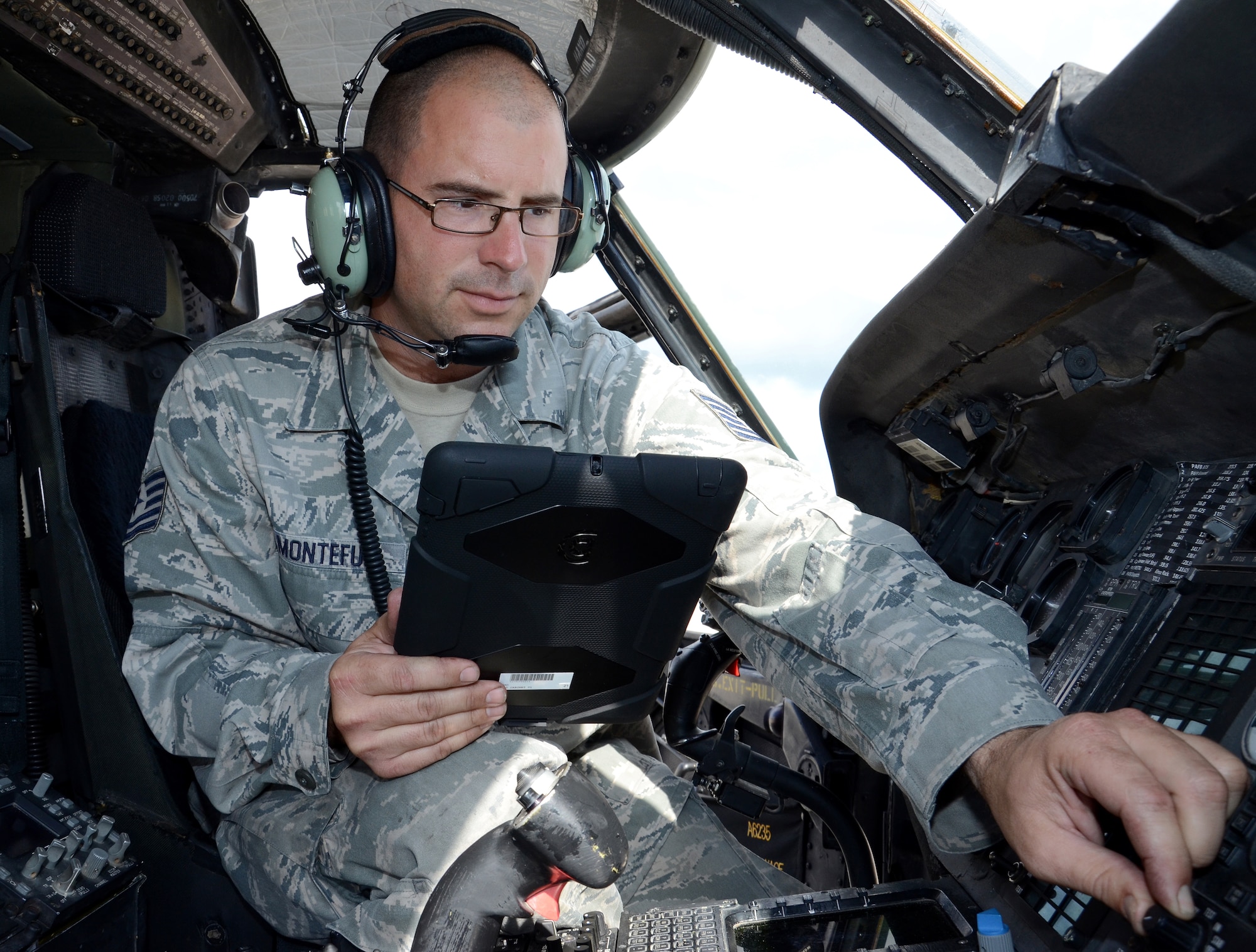 Tech. Sgt. Darren Montefu, 920th Rescue Wing reserve aircraft maintenance engineer, performs a pre-flight inspection using a semi-rugged commercial mobile device as a technical data reader, part of Air Force Reserve Command's eTools Lite initiative.  These devices were used during the Wing's recently successful HQ ACC/IG Operational Readiness Inspection, which noted "...the unit's superb use of technical data."  Montefu was recognized as a Superior Performer and received the ACC/IG General's Coin. (U.S. Air Force photo/2nd Lt. Leslie Forshaw)