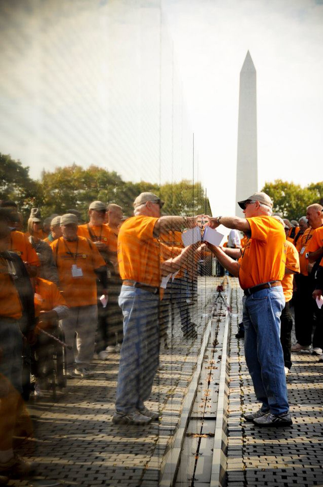 A Vietnam veteran look for names on the Vietnam Wall in Washington D.C., Oct. 23, 2012. This was the first Vietnam flight for the Honor Flight of Northwest Ohio.(Air National Guard photo by Master Sgt. Beth Holliker/Released).