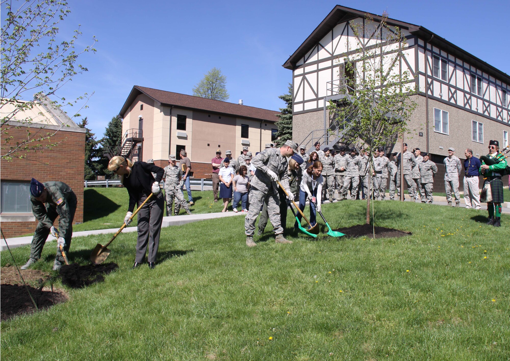 The base held its 18th Annual Tree Planting Ceremony with several members of Wing leadership digging in to help commemorate this year’s ‘Earth Day’ events May 3, 2013 on the Pittsburgh International Airport Air Reserve Station.  This year’s trees were planted on the side of Building 220 and marked the beginning of the day’s events, which also included a base clean-up and a water resource management presentation by Conservation Consultants Inc. Those who participated in the ceremony from left to right were:  Col. Jeffrey Kozak, 911th Airlift Wing vice commander; Ms. Mia Kubatka, NAF Services; Master Sgt. Stephen Cecil, 911th Operations Support Squadron aircrew flight equipment quality assurance NCO in charge; Capt. Diane Patton, 911th AW chief of safety; and Ms. Angela Haboush, Maytag work control contractor. (U.S. Air Force photo by Master Sgt. Mark A. Winklosky/Released)