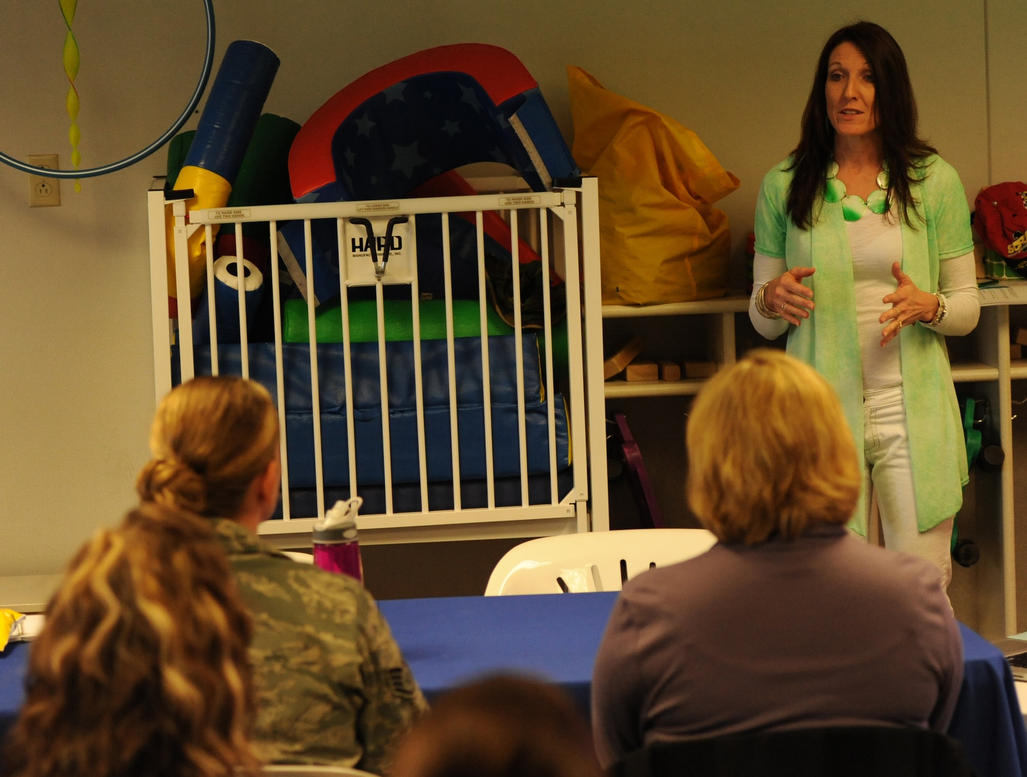 Michelle Henrich, Badger Clark Elementary School principal, describes BCES’s child pick-up and drop-off policy during an educational workshop in the Child Development Center at Ellsworth Air Force Base, S.D., May 2, 2013. Parents of soon to be kindergarten students attended the educational workshop in an effort to prepare themselves for their child’s first year in school. (U.S. Air Force photo by Airman 1st Class Hrair H. Palyan/Released)