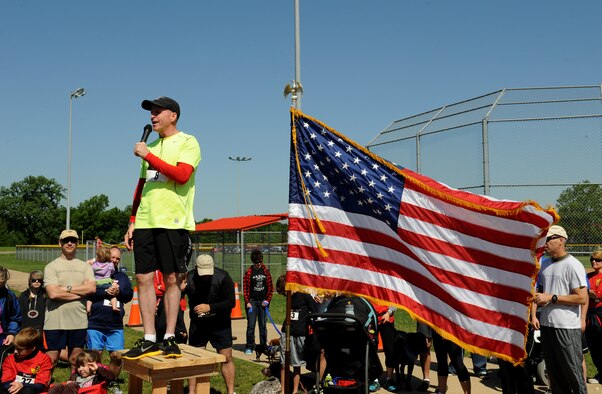Maj. Gen. Stephen Wilson, 8th Air Force commander, gives his closing remarks during the Mighty Eighth 8k on Barksdale Air Force Base, La., May 4, 2013. More than 120 base personnel and sponsored guests participated in the event. The event commemorated the 71st Anniversary of 8th Air Force. (U.S. Air Force photo/Airman 1st Class Benjamin Gonsier)