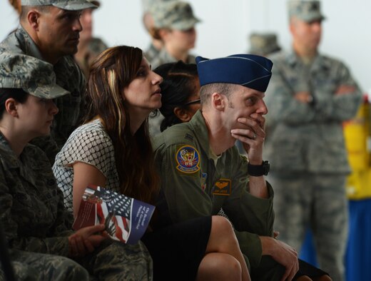 Family members, friends, co-workers mourn for Capt. James Steel, 77th Fighter Squadron pilot, during his memorial in Hangar 1200 at Shaw Air Force Base, S.C., April 30, 2013. More than 450 people attended the memorial. Steel passed away when his F-16 Fighting Falcon crashed in Afghanistan April 3, 2013. (U.S. Air Force photo by Senior Airman Tabatha Zarrella/Released)
