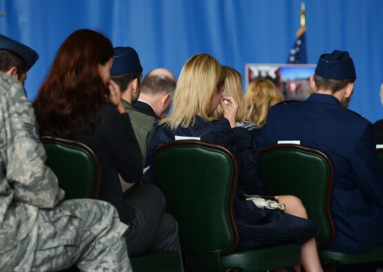 Family members, friends, co-workers mourn for Capt. James Steel, 77th Fighter Squadron pilot, during his memorial in Hangar 1200 at Shaw Air Force Base, S.C., April 30, 2013. More than 450 people attended the memorial. Steel passed away when his F-16 Fighting Falcon crashed in Afghanistan April 3, 2013. (U.S. Air Force photo by Senior Airman Tabatha Zarrella/Released)