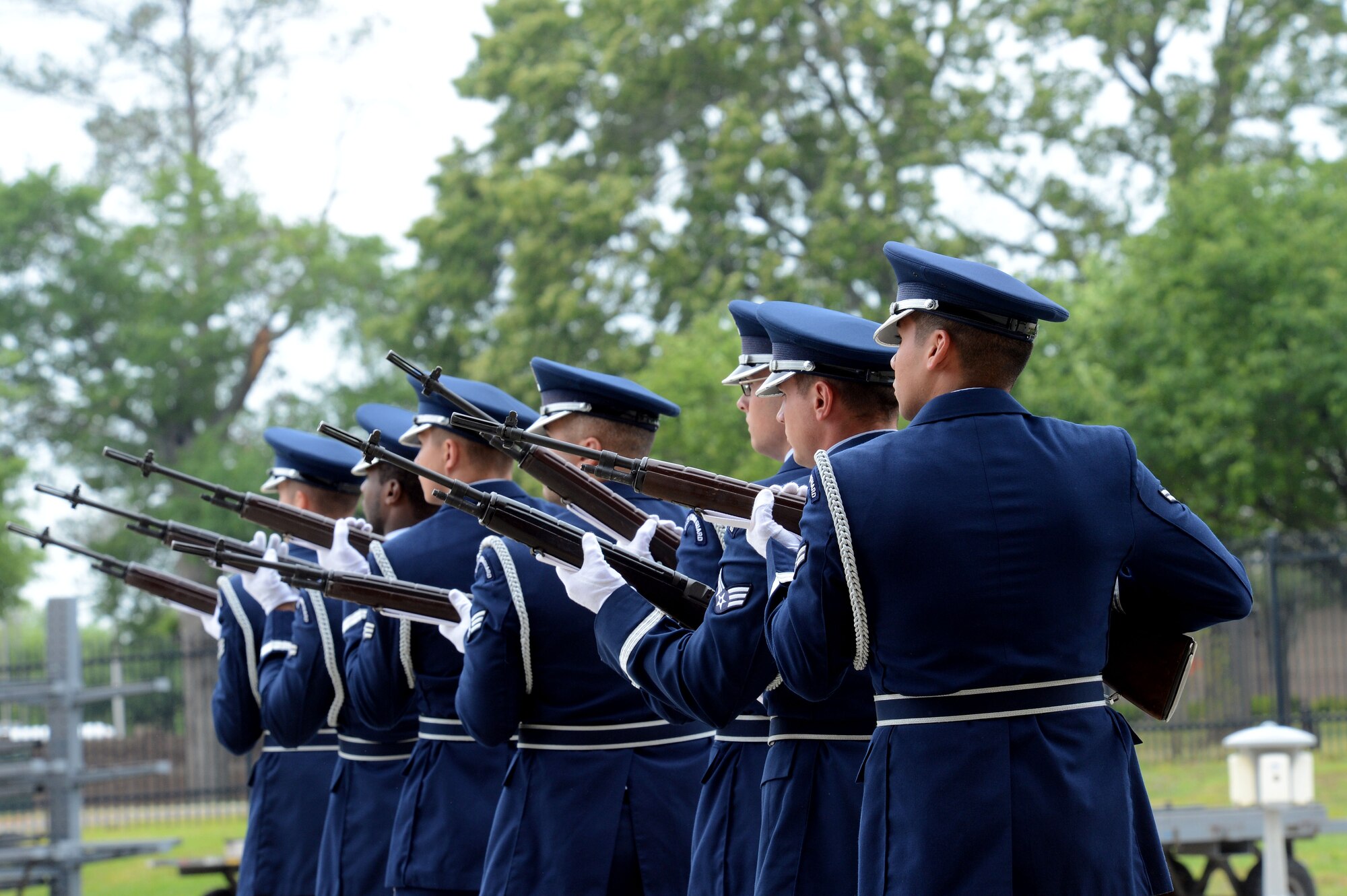 The Shaw honor guard performs a 21-gun salute at a memorial ceremony at Shaw Air Force Base, S.C., April 30, 2013.  The memorial ceremony commemorated the life and accomplishments of Capt. James Steel, 77th Fighter Squadron pilot, who died in an F-16 Fighting Falcon aircraft accident, while deployed to Afghanistan.  (U.S. Air Force photo by Airman 1st Class Nicole Sikorski/Released)