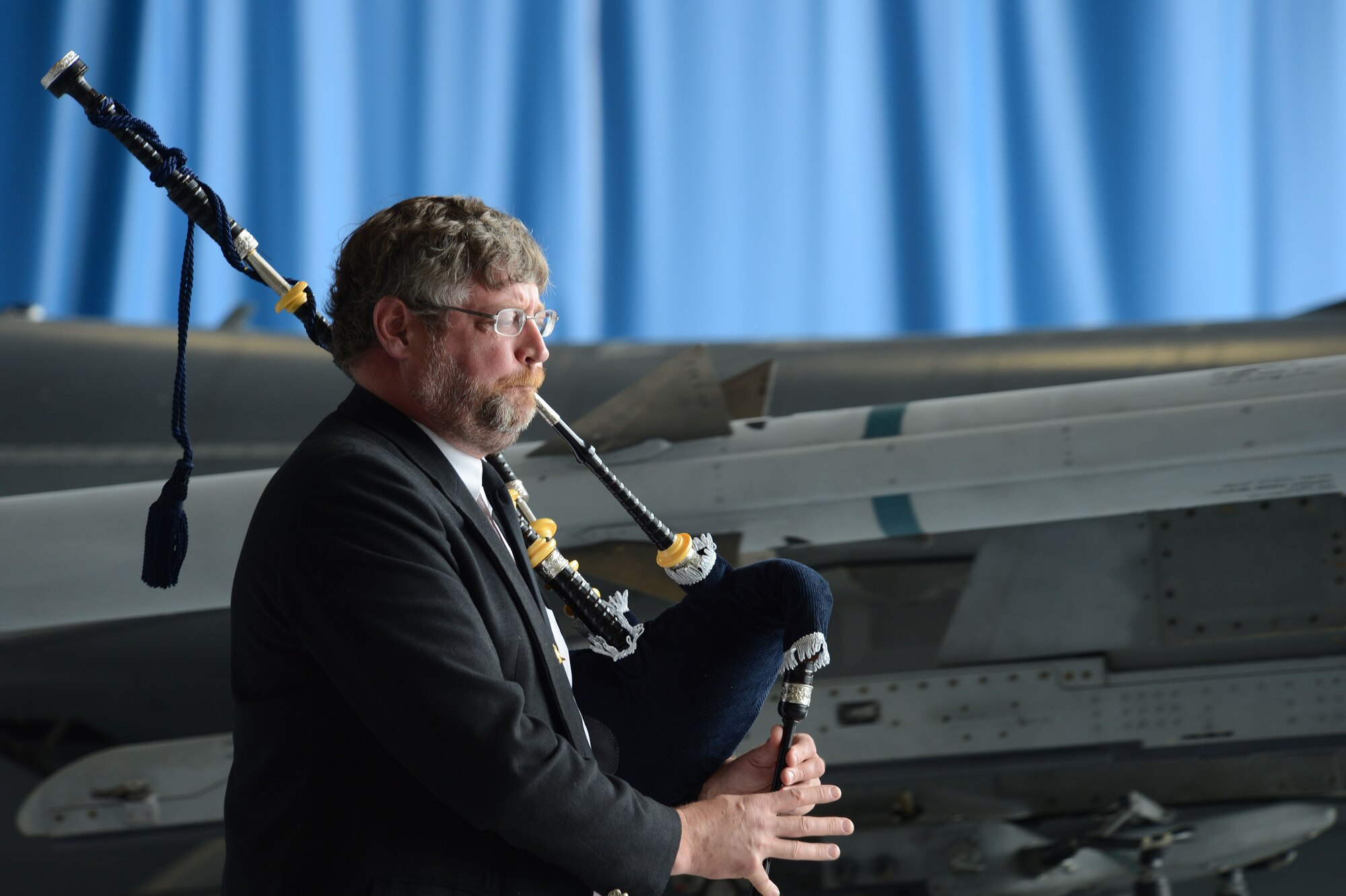 Retired U.S. Air Force Col. Robert Hopkins plays during a memorial ceremony at Shaw Air Force Base, S.C., April 30, 2013.  The memorial ceremony commemorated the life and accomplishments of Capt. James Steel, 77th Fighter Squadron pilot, who died in an F-16 Fighting Falcon aircraft accident, while deployed to Afghanistan.  (U.S. Air Force photo by Airman 1st Class Nicole Sikorski/Released)