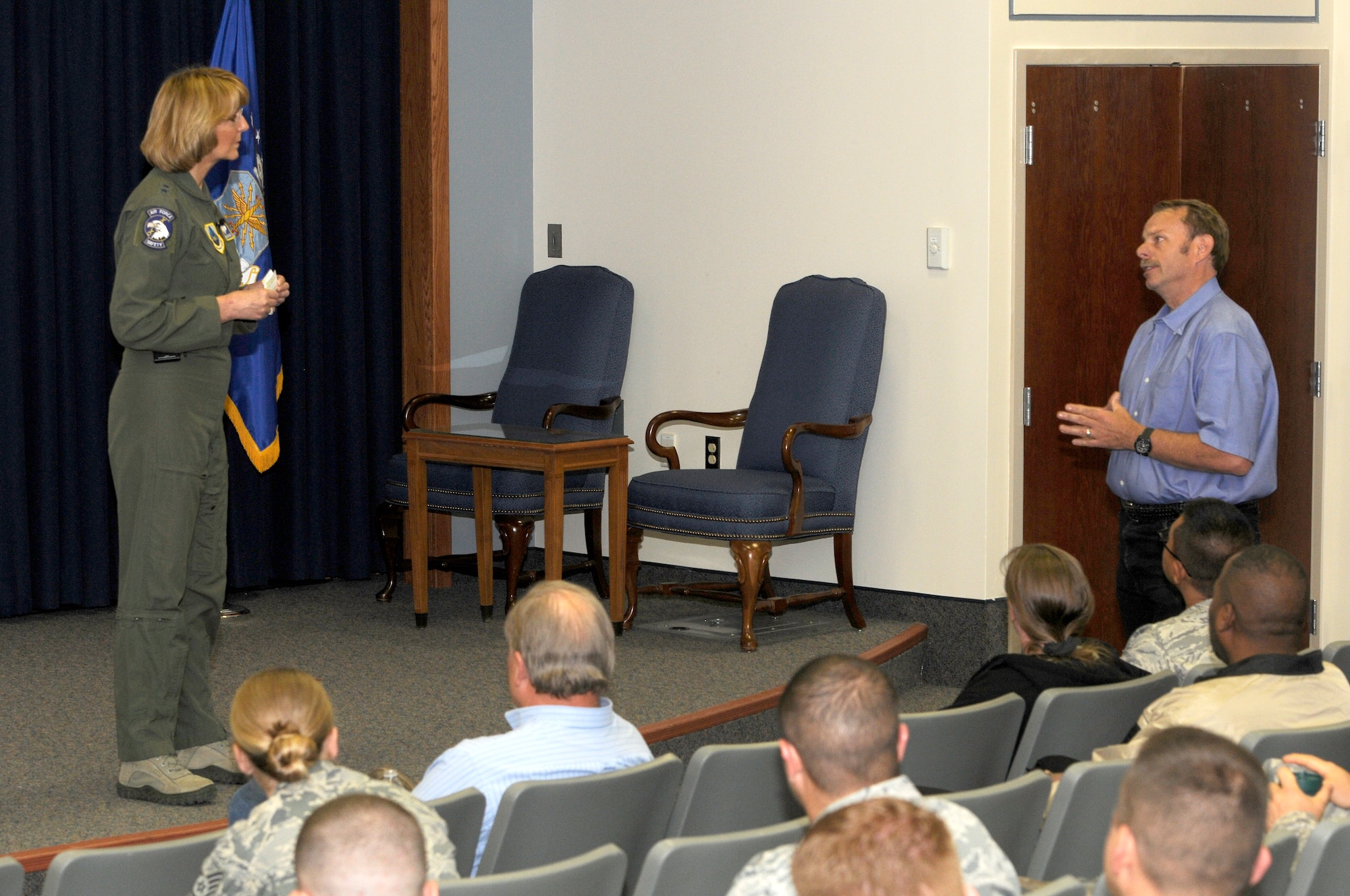 Ralph Crump, Kirtland Air Force Base ground safety manager, asks Maj. Gen. Margaret Woodward, Air Force chief of safety, a question concerning motorcycle training assistance during the Air Force Safety Center annual preseason motorcycle safety briefing held April 25 at the safety center. (U.S. Air Force photo by Keith A. Wright)